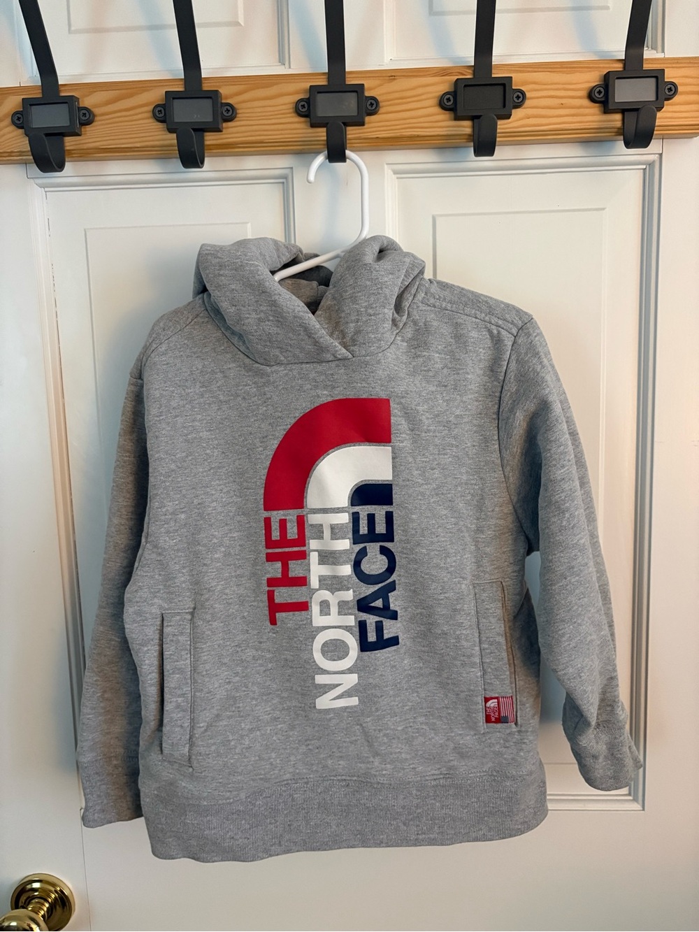 The North Face Kids Grey Hoodie with Red & Navy Logo